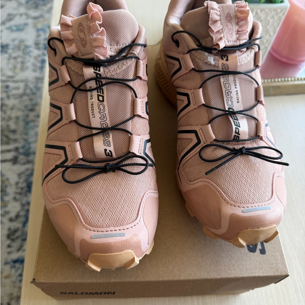 Salomon Trail Running Shoes in Peach Pink with Black Laces